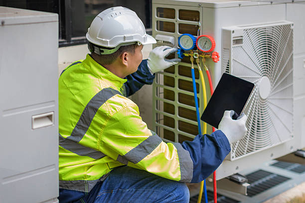 Professional Ac Repair technician working in Wellesley Hills, MA